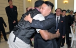 Kim Džong Un uživa uz Denisa Rodmana Foto: Reuters