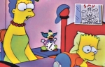 Mardž Simpson  sinu Bartu, koji se previja na krevetu, nudi knjigu  „Radoznali Džordž  i virus ebole”