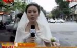 kineska novinarka u vencanici o zemljotresu