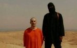 Na snimku se vidi kako džihadisti navodno obezglavljuju američkog novinara Džejmsa Folija, otetog pre dve godine