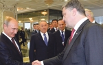 Čvrst stisak i pogled pravo u oči: Putin i Porošenko